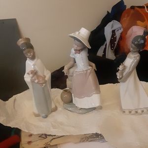 African porcilen statues  lladro